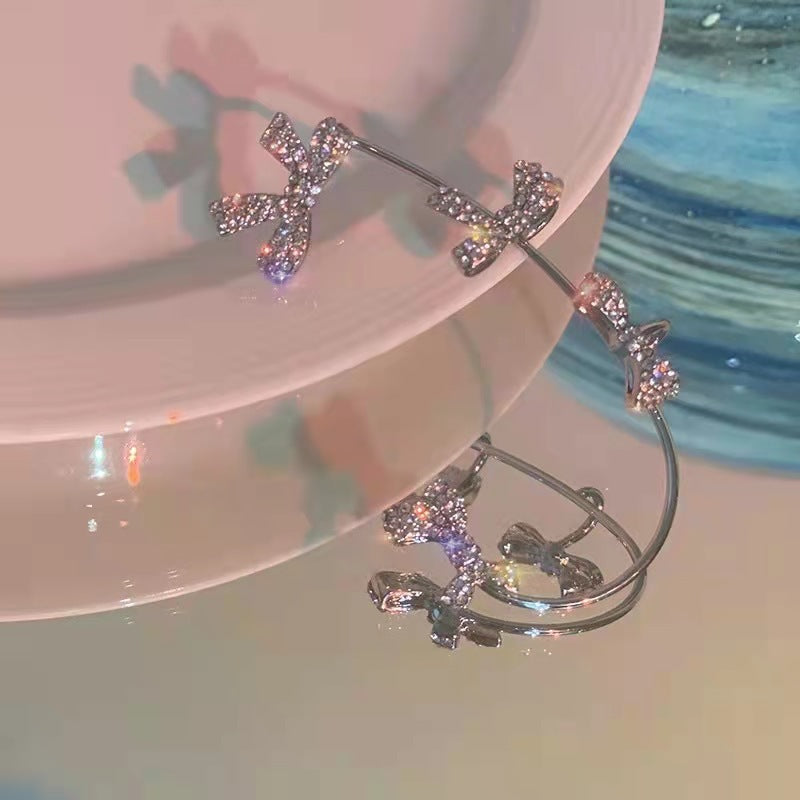 Manchette d'oreille nœud en strass Sweet Girl
