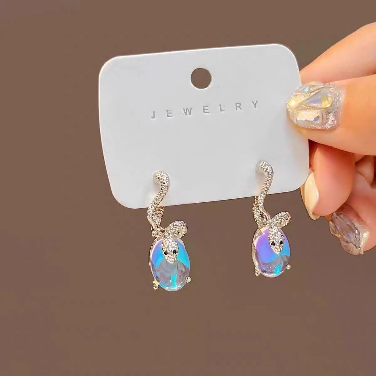 Designer-Ohrstecker in Schlangenform, Silber