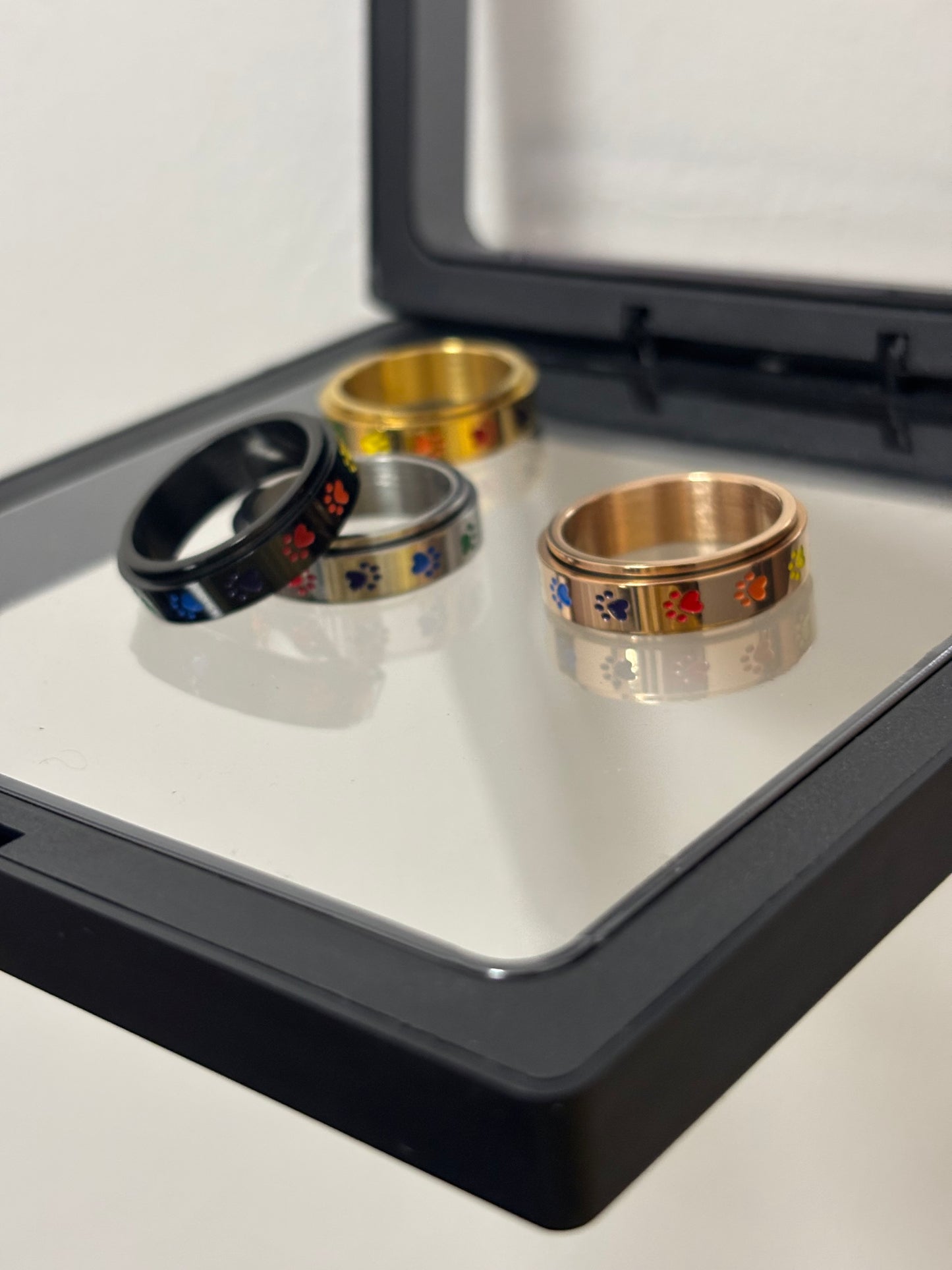 The Foxhole Court Rainbow Stainless Steel Rotatable rings