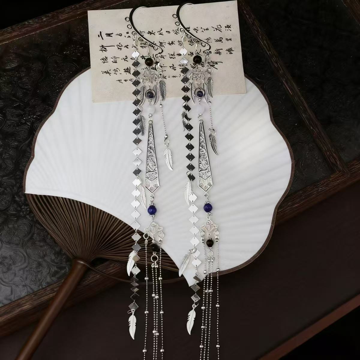 Antique-style Long Tassel Star Feather Ear Cuffs