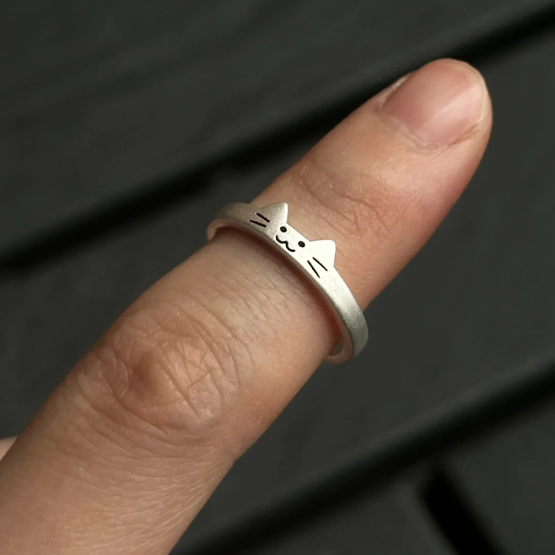 Süße offene Ringe aus Silber mit Katze und Hund