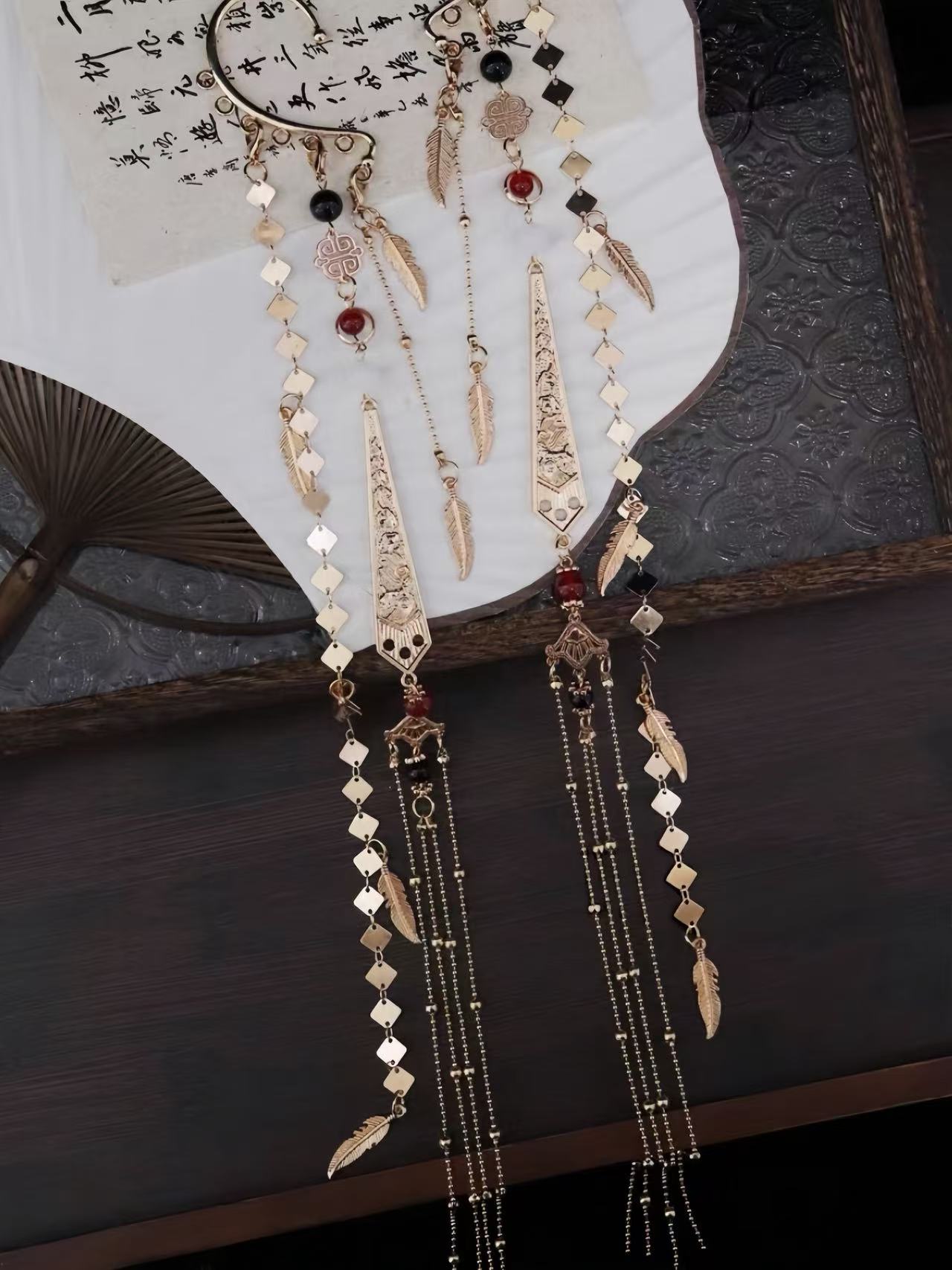 Antique-style Long Tassel Star Feather Ear Cuffs