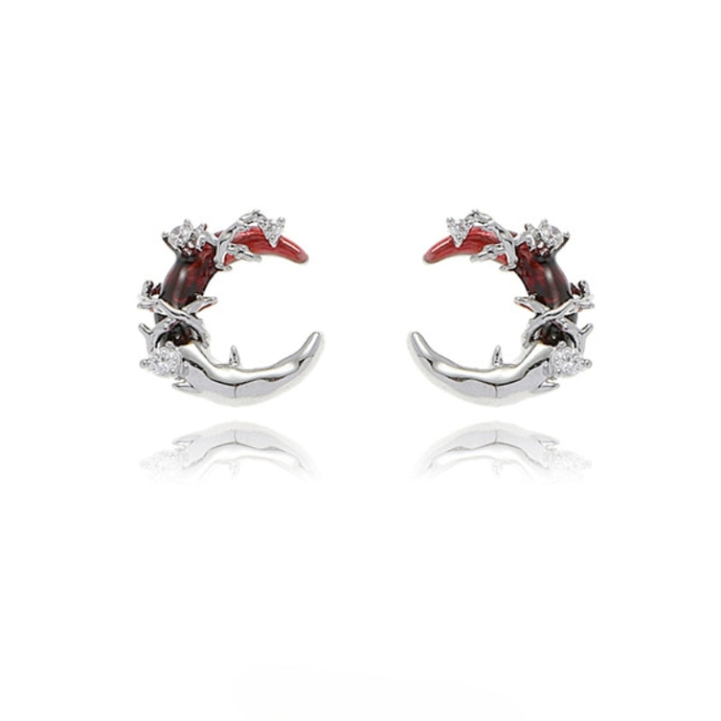 Ohrstecker im Gothic-Stil mit rotem Mond und leuchtendem Stern