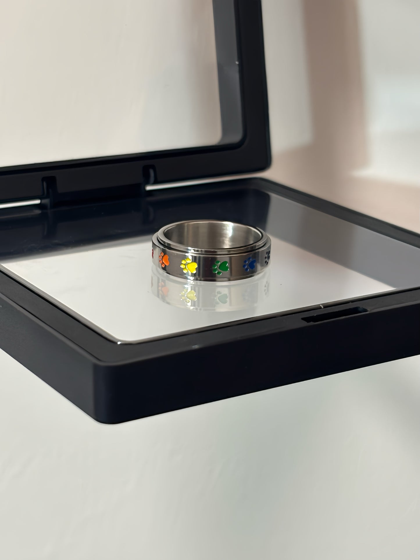 The Foxhole Court Rainbow Stainless Steel Rotatable rings