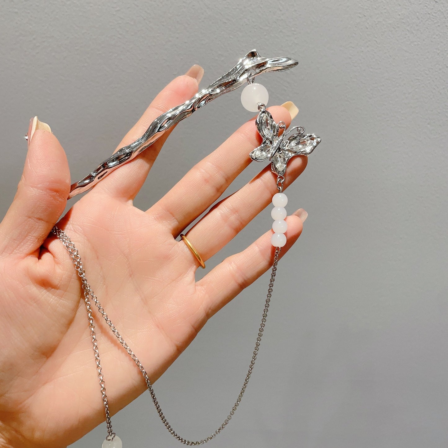 Haarnadel mit silberner Schmetterlingsquaste für Damen im chinesischen Stil