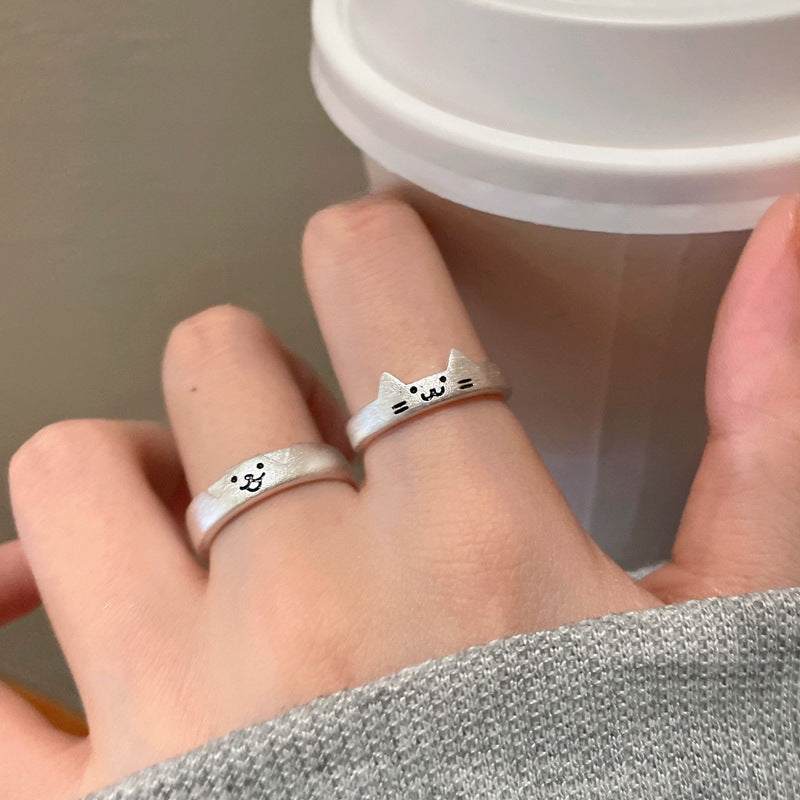 Süße offene Ringe aus Silber mit Katze und Hund