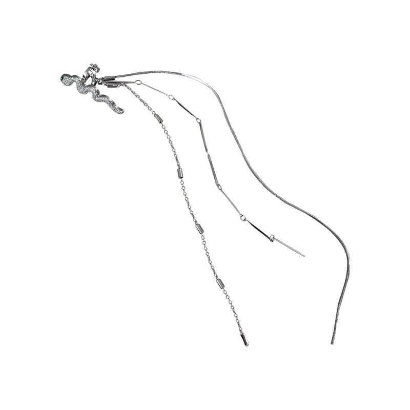 Damen Schicker Ohrclip mit Schlangen-Motiv, lang, Quaste