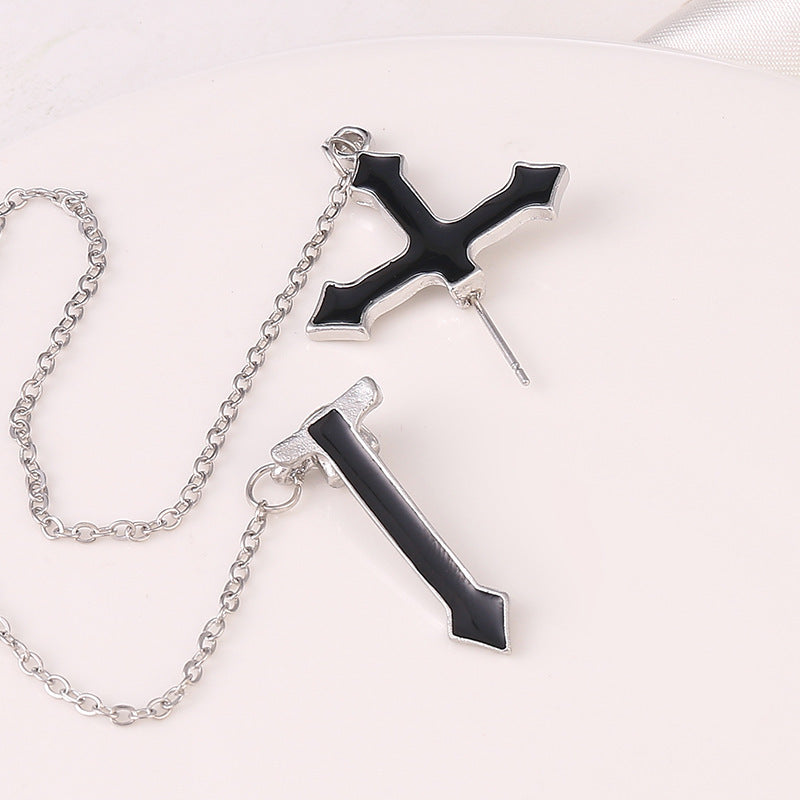 Schicker Unisex-Ohrring mit schwarzer Kreuzquaste