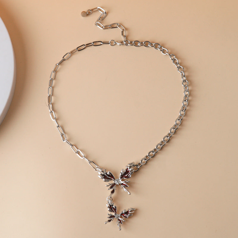 Gothic Halskette aus Metall mit zwei roten Schmetterlingen